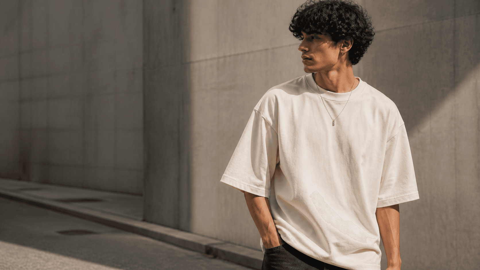 Model wearing a relaxed SLAYFITS tee for everyday wear